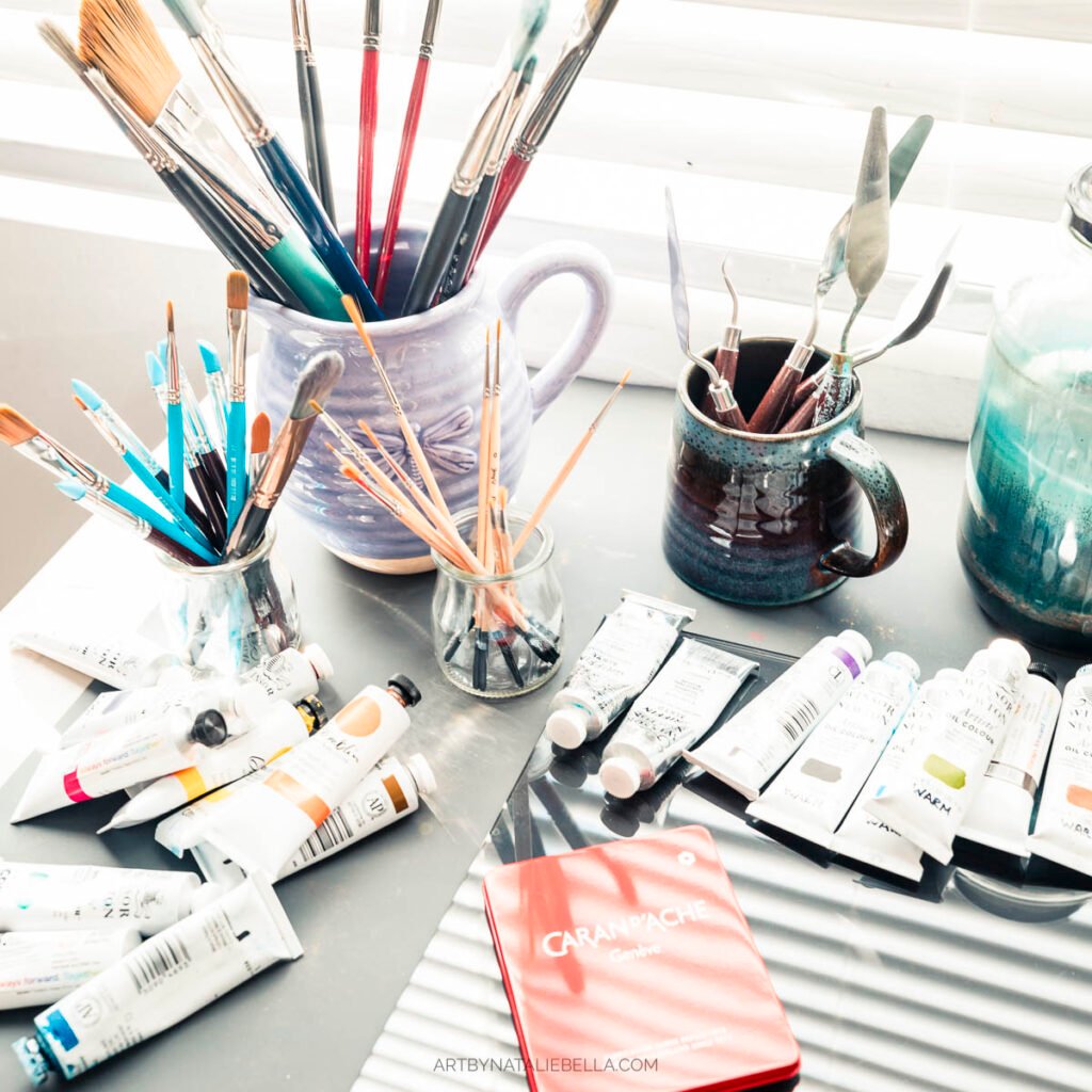 Art Supplies in Artist Studio - Paint Brushes Oil Paints and Pastels
