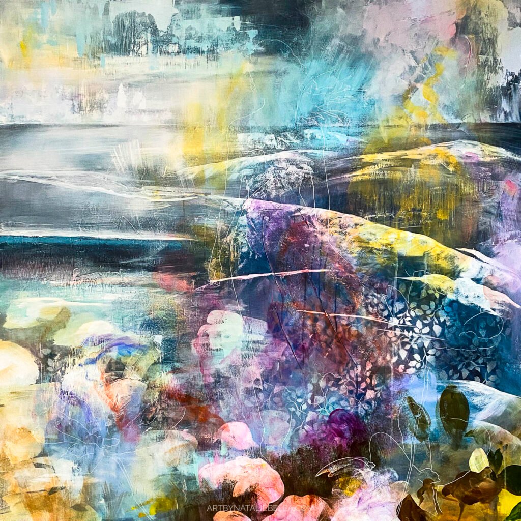 Large scale abstract painting work in progress showing luminous blues, purples, and golden yellow paint layers with ethereal flowing composition, 48x48 inches mixed media on canvas by artist Natalie Bella