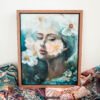 Where Ethereal Dreams Bloom - Original oil painting on canvas by Natalie Bella featuring a dreamy portrait of a woman surrounded by white flowers with golden centers against a soft teal background, contemporary mixed media art, 16x20 inches