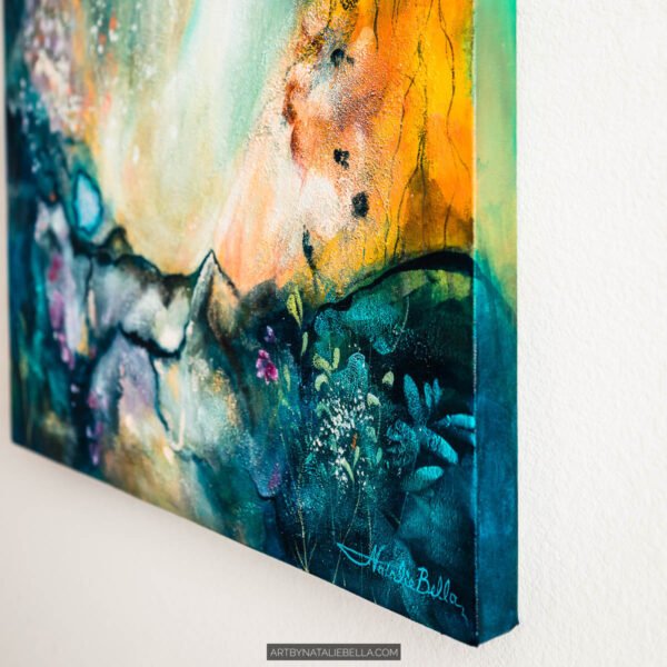 Awakening - Teal and Orange Abstract Painting Lower Side View by Lower side view of Awakening showing warm orange and deep teal tones with botanical elements and artist signature, an original 24x24 mixed media abstract painting on gallery-wrapped canvas by Natalie Bella
