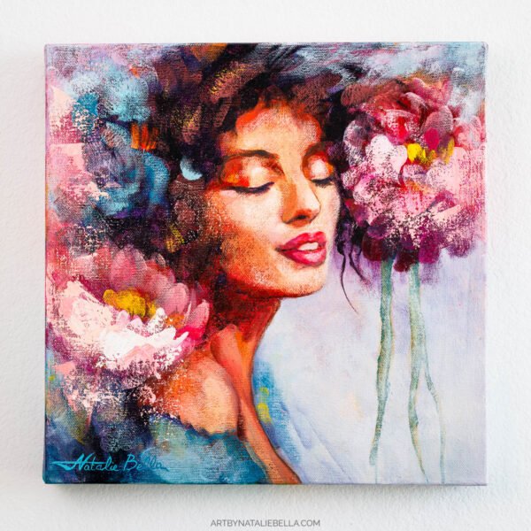 There's a quietness to her - the kind that comes when you stop reaching outward and settle into yourself. The pink bloom in her hair feels like the first soft answer from within. From the Spring Within collection.